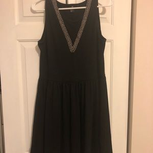 Black dress with embellished neckline